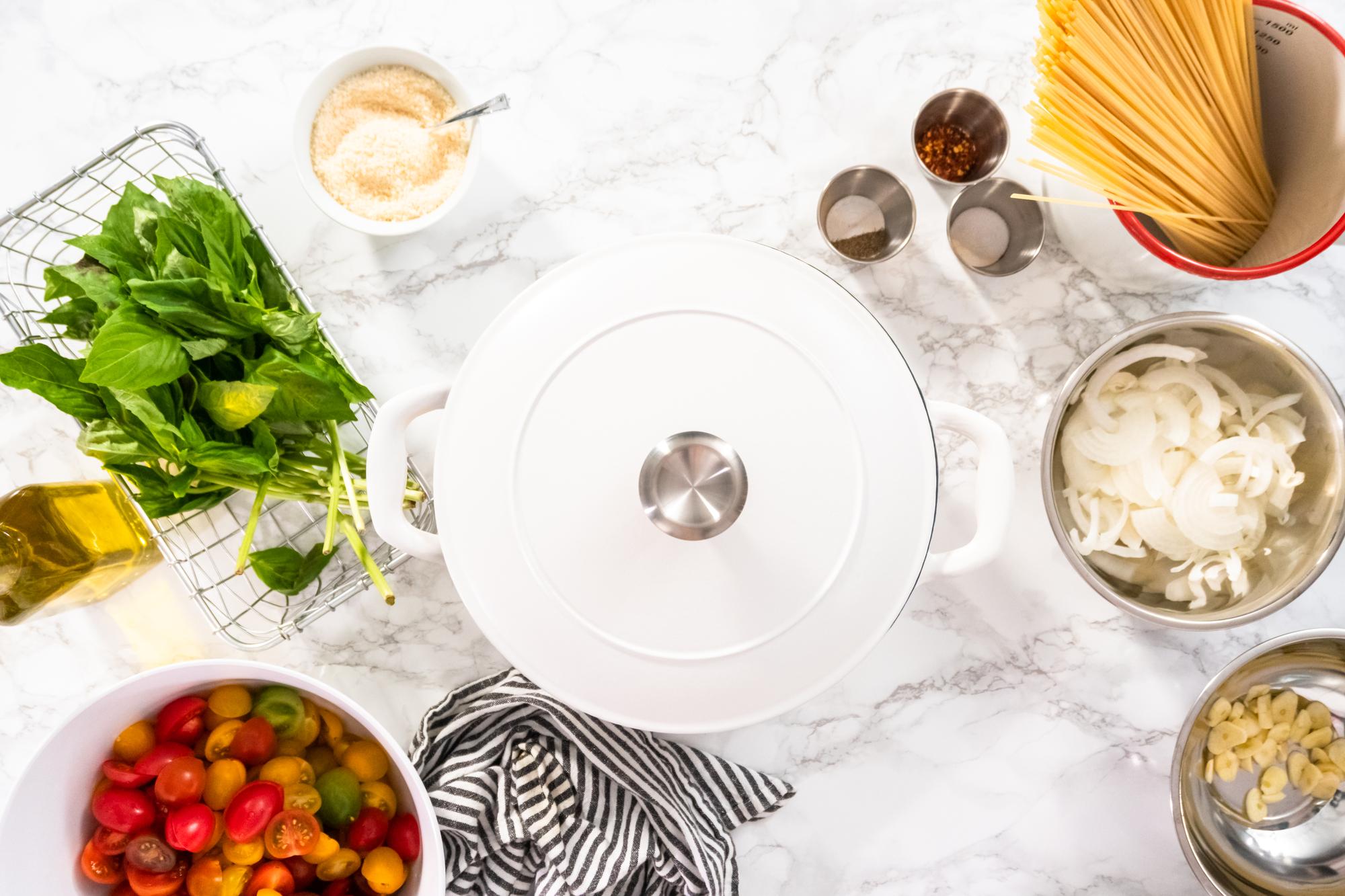 Kitchen workspace with tools and plated food